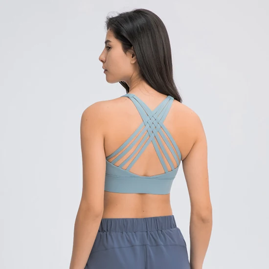 Reggiseni sportivi superiori per yoga da donna con spalline incrociate all'ingrosso che assorbono l'umidità